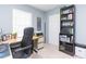 Well-organized office with a comfortable chair, desk, shelving, and natural light from the window at 6412 S Richard Ave, Tampa, FL 33616