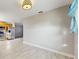 Open dining area featuring plank flooring that flows into the kitchen at 6901 10Th N St, St Petersburg, FL 33702