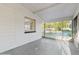 View from the enclosed porch looking out to the front of the property at 6901 10Th N St, St Petersburg, FL 33702