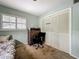 Bedroom featuring a large closet, light blue walls, and a window for natural light at 6901 Arbor Oaks Ct, Bradenton, FL 34209