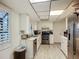 Functional kitchen with stainless steel appliances, and ample storage space at 6901 Arbor Oaks Ct, Bradenton, FL 34209