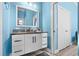 Stylish bathroom features granite counters, modern vanity with ample storage and framed mirror at 716 Laurel Ave, Venice, FL 34285