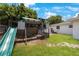 Backyard with playset and lush lawn at 8339 75Th Ave, Seminole, FL 33777