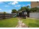Spacious backyard with playset, green lawn, and shed at 8339 75Th Ave, Seminole, FL 33777