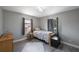 Cozy bedroom with neutral tones, natural light, and hardwood floors at 8339 75Th Ave, Seminole, FL 33777