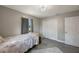 Comfortable bedroom offers a closet, window, and door at 8339 75Th Ave, Seminole, FL 33777