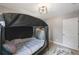 Bedroom has wood floors, a window, and a white dresser at 8339 75Th Ave, Seminole, FL 33777