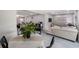 Cozy dining area adjacent to living spaces features backyard views and modern finishes at 8339 75Th Ave, Seminole, FL 33777
