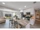 Spacious kitchen featuring a kitchen island with barstool seating and stainless steel appliances at 8339 75Th Ave, Seminole, FL 33777