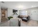 Inviting living room features a comfortable leather sectional and modern lighting at 8339 75Th Ave, Seminole, FL 33777