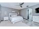 Spacious main bedroom with neutral gray walls and an ensuite bathroom at 9827 Sorbonne Loop, Seffner, FL 33584