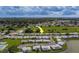 Aerial view of the community with a golf course in the background at 10005 41St N St, Pinellas Park, FL 33782