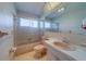 Bathroom featuring pink tiles, shower, sink, and vanity at 10005 41St N St, Pinellas Park, FL 33782