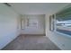 Bedroom featuring neutral carpet, light walls and bright windows at 10005 41St N St, Pinellas Park, FL 33782