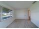 Bedroom featuring neutral carpet, light walls and bright windows at 10005 41St N St, Pinellas Park, FL 33782
