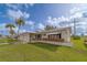 Charming single-story home with well-maintained lawn, landscaping, and convenient carport at 10005 41St N St, Pinellas Park, FL 33782