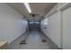 Spacious garage features a gray garage door and white walls at 10005 41St N St, Pinellas Park, FL 33782