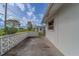 Side patio featuring decorative concrete block wall at 10005 41St N St, Pinellas Park, FL 33782
