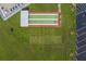 Aerial view of a shuffleboard court with benches and a nearby parking lot at 10005 41St N St, Pinellas Park, FL 33782