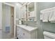 Charming bathroom with a white vanity, stylish fixtures, and modern neutral paint color at 11775 84Th Ave, Seminole, FL 33772