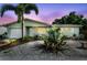 Charming single-story home with lush landscaping and a well-maintained exterior and manicured lawn at 11775 84Th Ave, Seminole, FL 33772