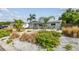 Charming single-story home with lush landscaping and a well-maintained exterior and manicured lawn at 11775 84Th Ave, Seminole, FL 33772