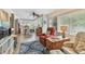 Bright and cozy living space, with seamless flow to the dining area, creating an inviting atmosphere at 11775 84Th Ave, Seminole, FL 33772