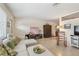 Comfortable living room featuring polished terrazzo floors, and neutral tones at 11775 84Th Ave, Seminole, FL 33772