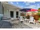 Cozy patio features brick pavers, outdoor seating, grill, and access to the home, perfect for entertaining at 11775 84Th Ave, Seminole, FL 33772