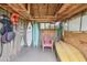 The shed's interior is neat and organized, offering efficient storage for kayaks, surfboards and more at 11775 84Th Ave, Seminole, FL 33772