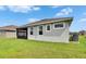 Well-kept backyard featuring a screened-in lanai and a modern exterior, ideal for outdoor enjoyment at 11785 Little River Way, Parrish, FL 34219