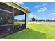 Lanai features lake and backyard views at 11785 Little River Way, Parrish, FL 34219
