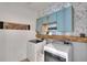 Charming laundry room with decor and modern appliances at 11785 Little River Way, Parrish, FL 34219
