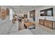 Bright living room with modern decor, open floor plan and lots of natural light at 11785 Little River Way, Parrish, FL 34219