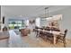 Open concept living spaces with water view at 11785 Little River Way, Parrish, FL 34219