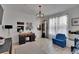 Bright play room with stylish light fixture, desk and decor at 11785 Little River Way, Parrish, FL 34219