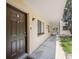 Condo entryway with modern door, lighting, and convenient access at 11809 Raintree Lake Ln # A, Tampa, FL 33617