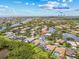 Aerial view of a home surrounded by lush landscaping and close to Downtown St. Pete at 1191 Darlington Oak Ne Dr, St Petersburg, FL 33703