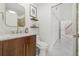 Bathroom with marble countertop, modern fixtures and shelves at 1191 Darlington Oak Ne Dr, St Petersburg, FL 33703