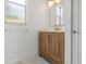 Bathroom featuring modern vanity and fixtures at 1191 Darlington Oak Ne Dr, St Petersburg, FL 33703
