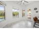 Breakfast nook featuring windows with a view of the screened pool area at 1191 Darlington Oak Ne Dr, St Petersburg, FL 33703