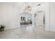 Elegant living room featuring archways, neutral décor, and lots of natural light at 1191 Darlington Oak Ne Dr, St Petersburg, FL 33703