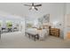 Spacious main bedroom featuring a seating area and tranquil ambiance, perfect for relaxation at 1191 Darlington Oak Ne Dr, St Petersburg, FL 33703