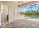 Covered patio featuring access to a bathroom and a view of the pool at 1191 Darlington Oak Ne Dr, St Petersburg, FL 33703
