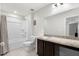 Bathroom featuring a single vanity and a shower-tub combination at 12481 Aston Dr, Hudson, FL 34669