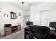 Bedroom with desk and media center, carpeted floors, neutral paint and closet at 12481 Aston Dr, Hudson, FL 34669