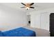 Bedroom with closet and view to the primary bathroom at 12481 Aston Dr, Hudson, FL 34669