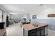 Open floorplan with kitchen island overlooking dining area and Gathering room, great for entertaining at 12481 Aston Dr, Hudson, FL 34669