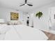 Serene main bedroom with en-suite bathroom and a view to the kitchen at 1349 Tyrone N Blvd, St Petersburg, FL 33710