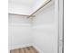 Walk-in closet with ample storage space and modern flooring at 1349 Tyrone N Blvd, St Petersburg, FL 33710